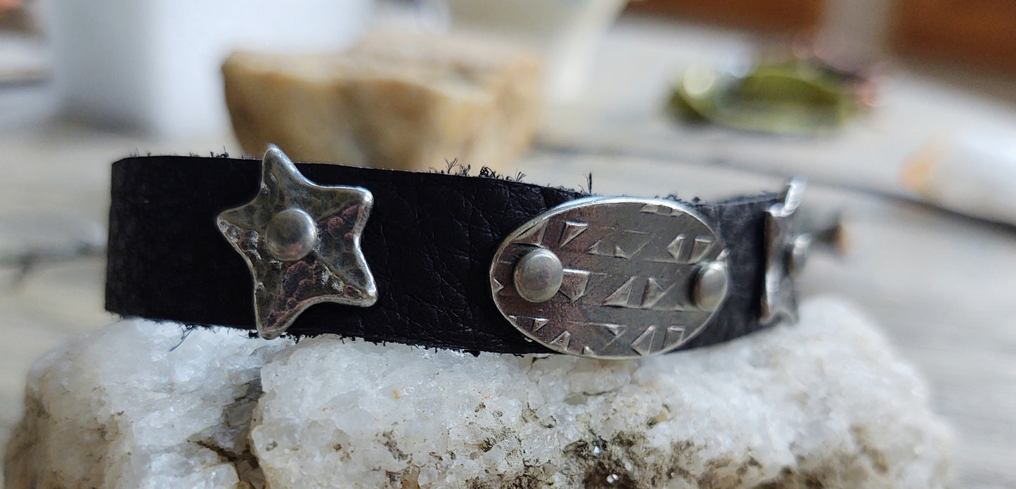 Hey, hey. My, my... {silver and black leather}