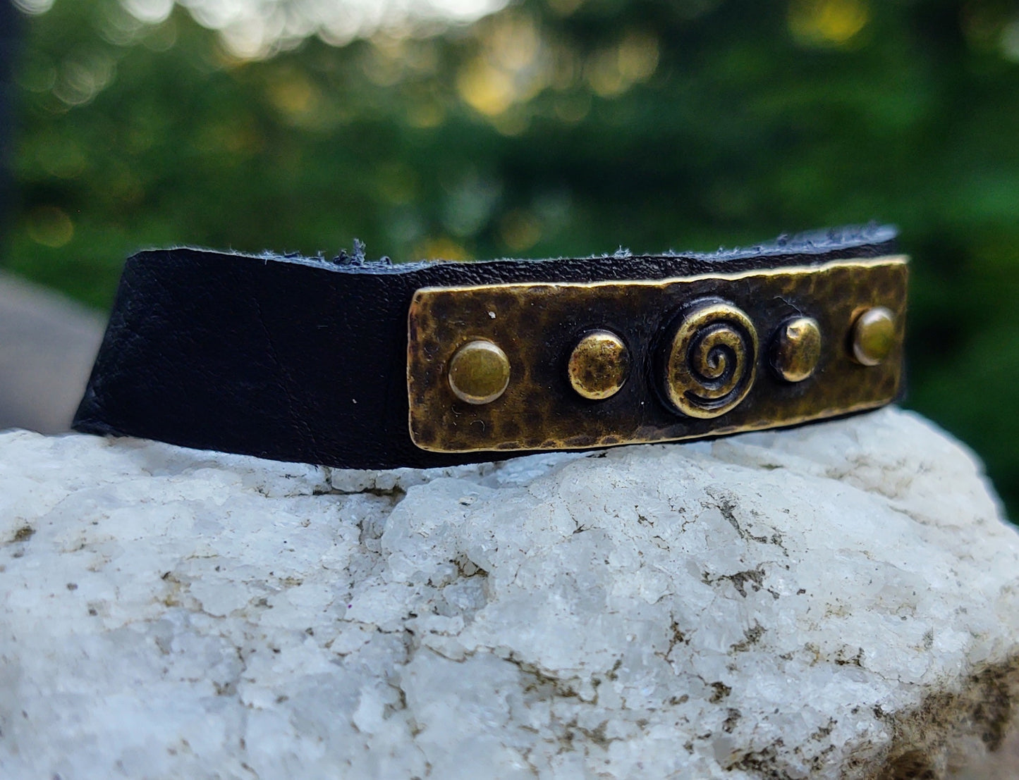 Spiral Vibes  [brass and black leather}